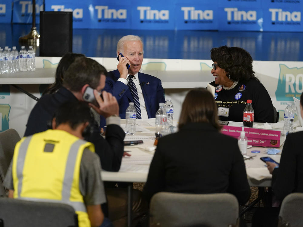 President Biden works the phones during a grassroots volunteer event with the Oregon Democrats at the SEIU Local 49 in Portland, Ore., on Friday.