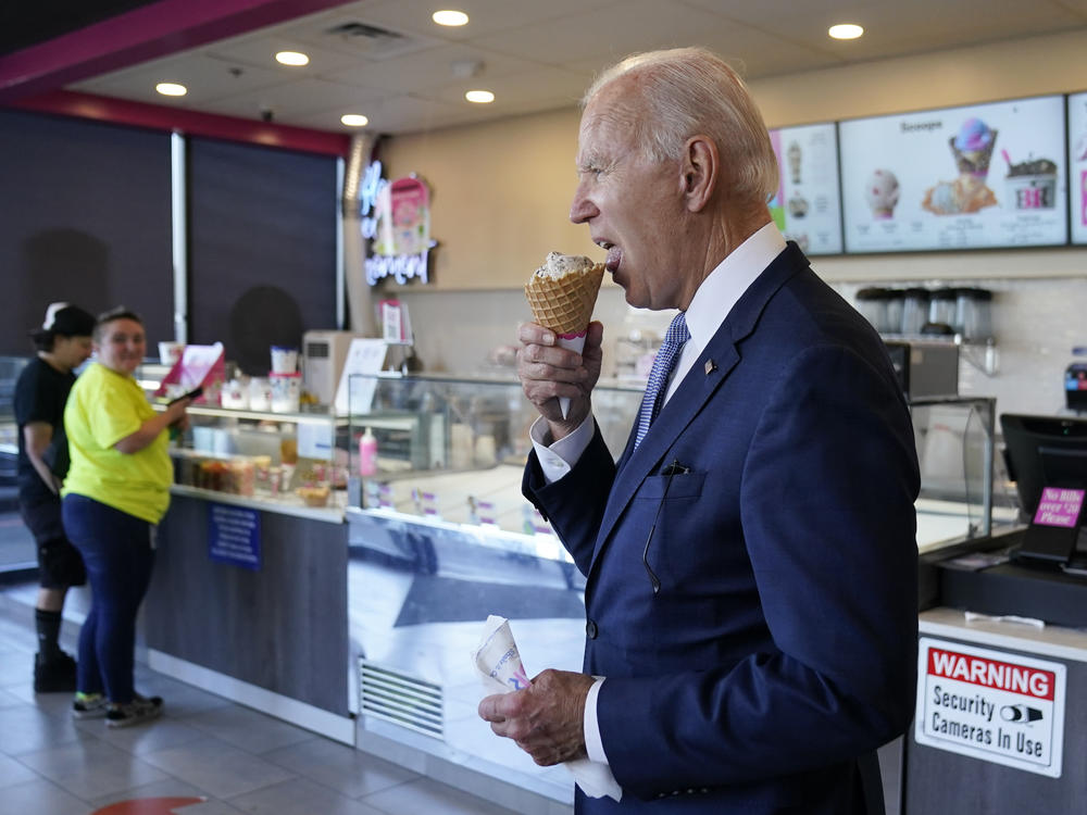 President Biden eats an ice cream cone at a Baskin-Robbins in Portland, Ore., at the end of his Western campaign swing.