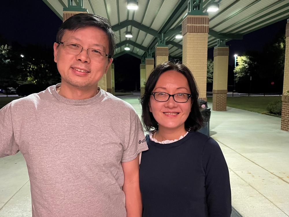 Wei Kang Ding and Judy Zhu outside of a candidate debate hosted by high school students on Sept. 28. in Johns Creek, Ga. Ding and Zhu say they are still doing their election research.