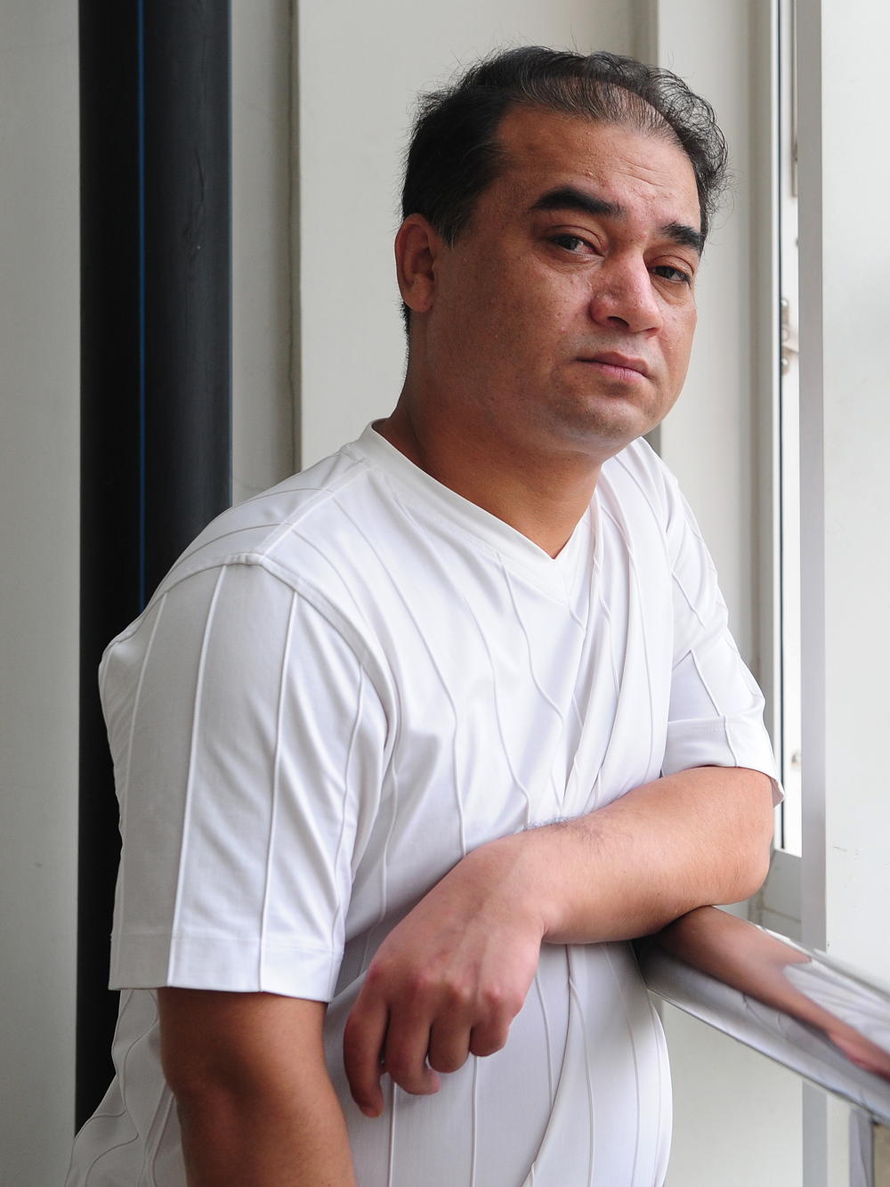 Ilham Tohti, university professor, blogger and activist, in Beijing on Jun 12, 2010. Tohti, an outspoken activist for Uyghur rights, was sentenced to life imprisonment in China for 