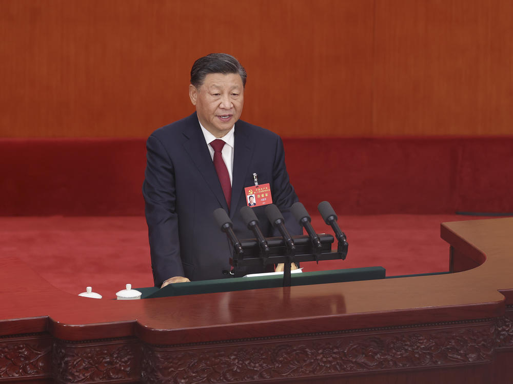 Chinese President Xi Jinping delivers a speech during the opening session of the 20th National Congress of the Communist Party of China on Sunday in Beijing.