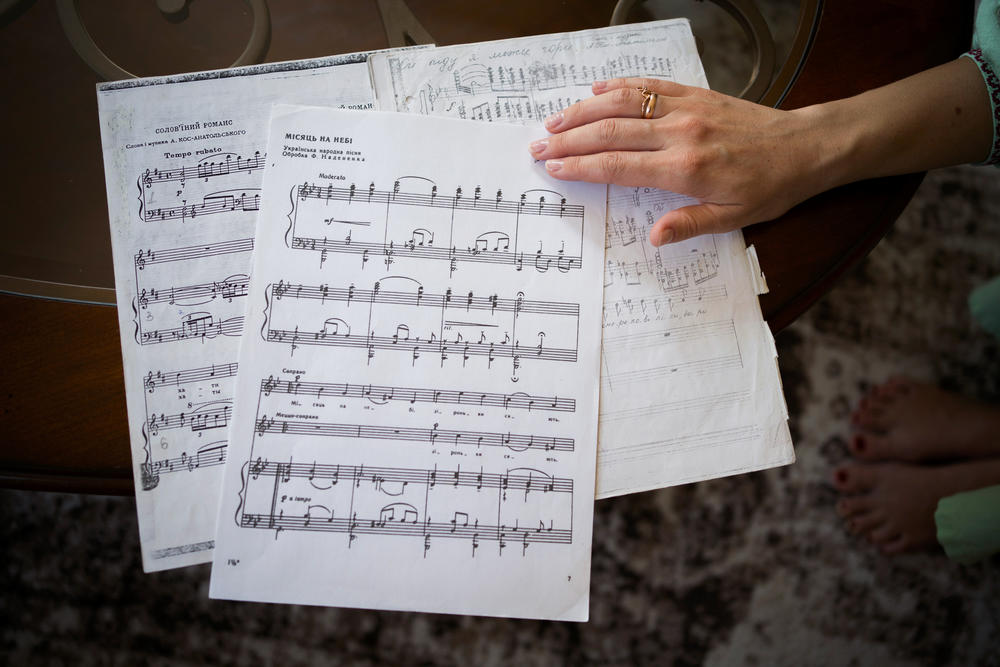 Olha Abakumova brought her most treasured sheet music, including a copy of the handwritten score given to her by her concert master in Odesa, where she was a vocal instructor and performer.