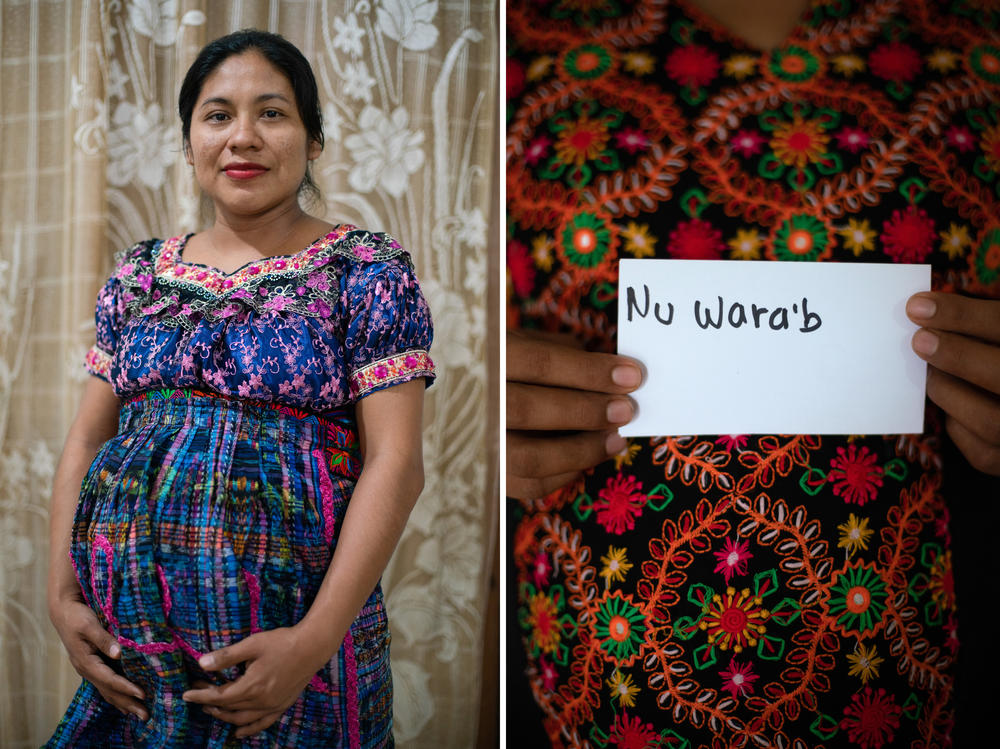 Rosa's 29-year-old daughter Ana María Chipel Gonzalez was born in Mexico but speaks K'iche' nearly fluently. Ana María holds a sign that reads 