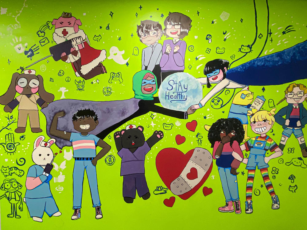 This mural is on the wall of the Child and Adolescent Health Center at Grant Middle School in Michigan.