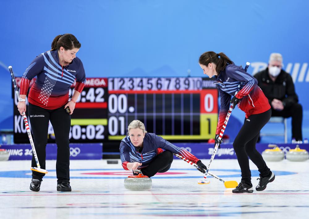 U.S. curlers Becca Hamilton (from left), Nina Roth and Tara Peterson compete at the Beijing Winter Olympics in February. The sport normally sees a bump in interest during an Olympics — but it's also experiencing other challenges, including a leadership struggle.