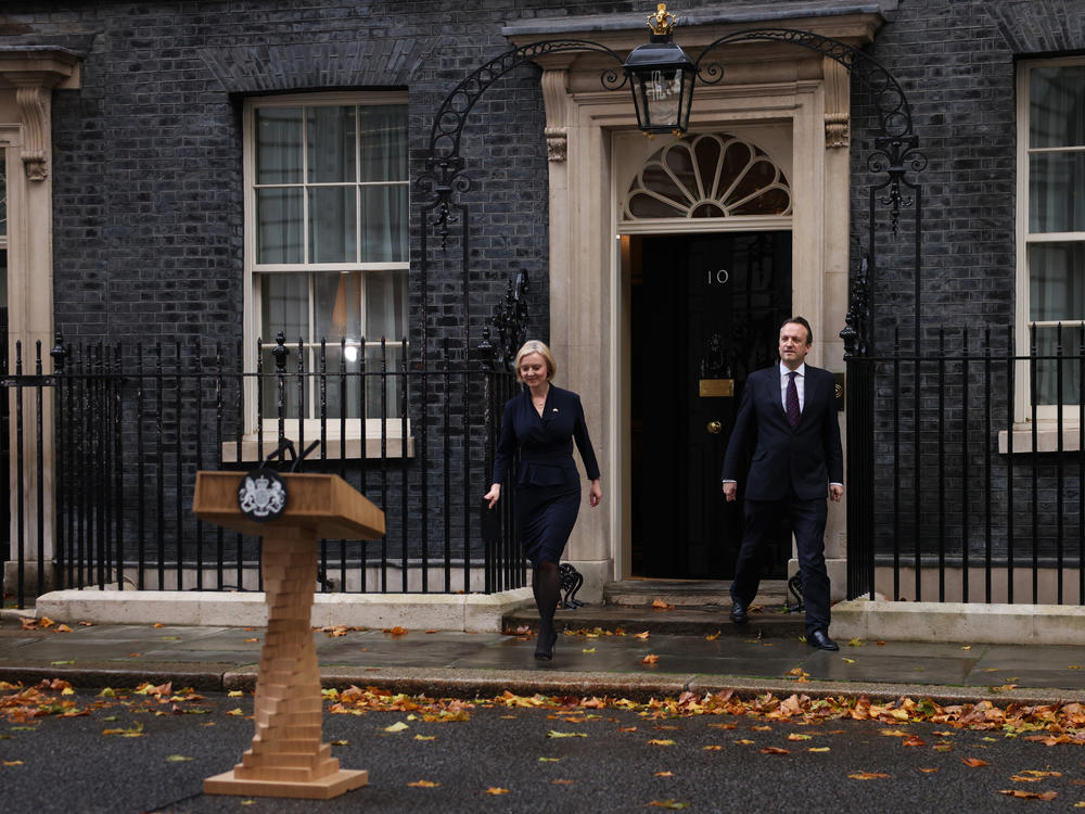 Prime Minister Liz Truss walks out of No.10 Downing St. to announce her resignation on Thursday in London.