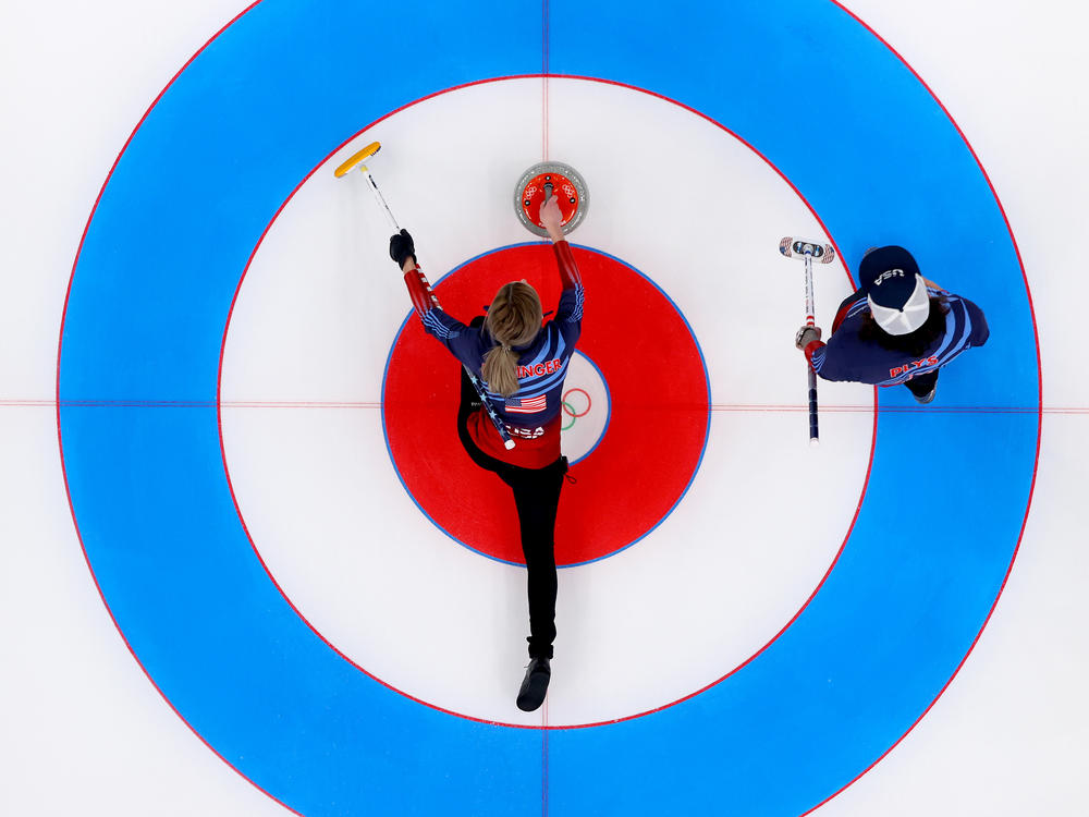 Victoria Persinger (left) and Christopher Plys of Team USA compete against Team Norway during the Curling Mixed Doubles Round Robin ahead of the Beijing 2022 Winter Olympics at the National Aquatics Center in Beijing on on Feb. 3.