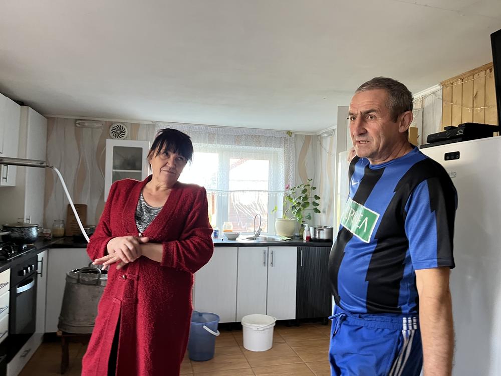 Volodymyr and Svitlana Tsyba speak in their home in Hrushivka, Ukraine, on Oct. 18. They say they were detained by Ukrainian intelligence officials looking for Russian collaborators.