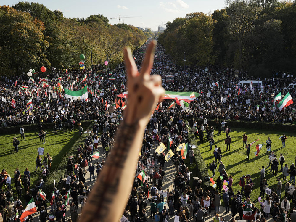 A man gestures as people attend a protest against the Iranian regime in Berlin on Saturday.