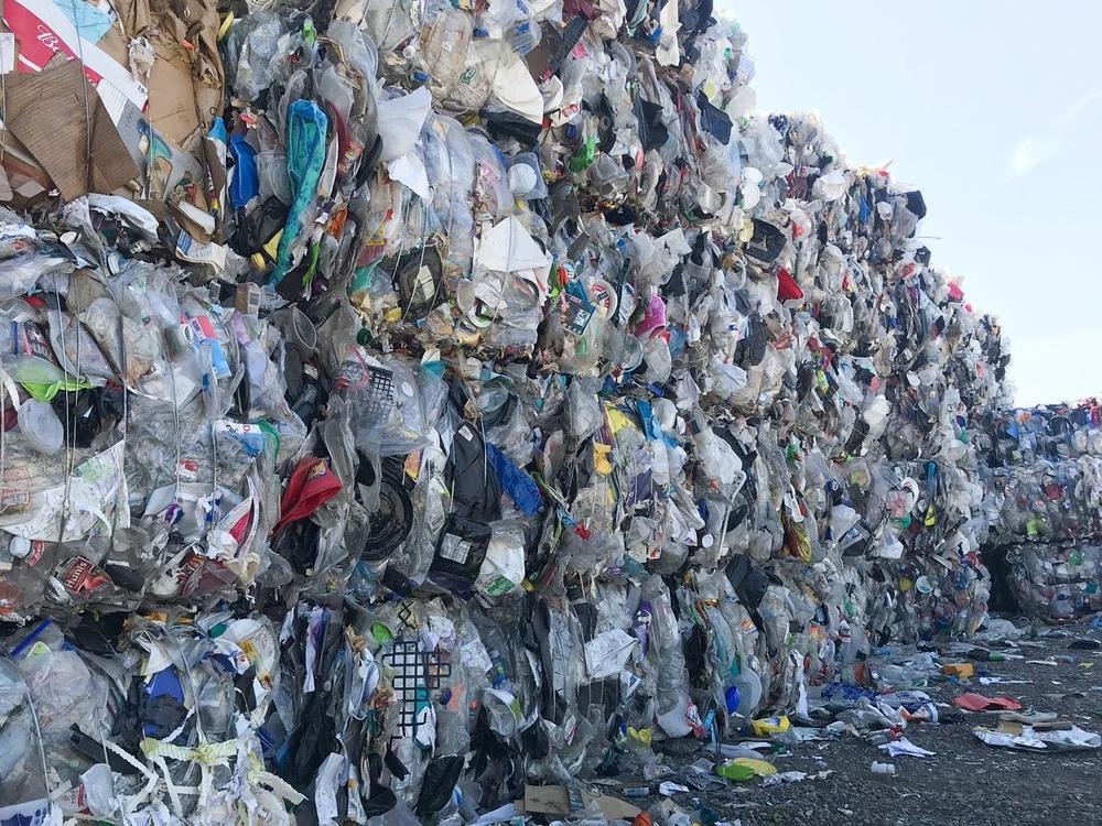 Unwanted used plastic sits outside Garten Services, a recycling facility in Oregon.