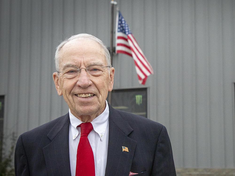 Iowa Republican U.S. Sen. Chuck Grassley poses for a photo outside Atlantic Coca Cola Bottling Co. in Walcott on Oct. 14.