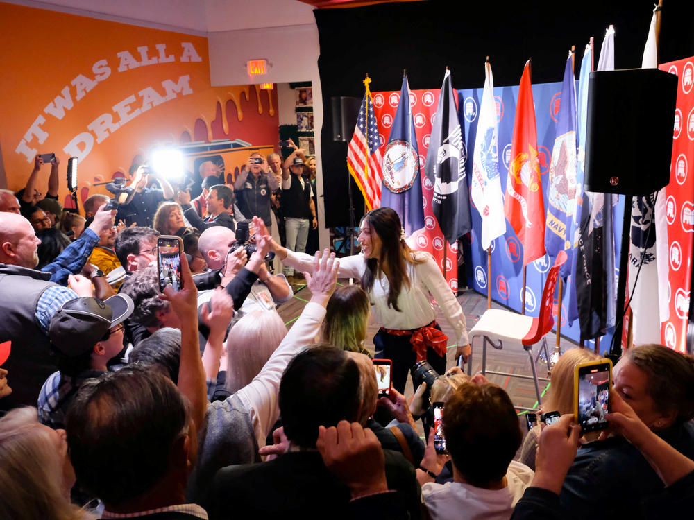 Vega greets supporters in Fredericksburg. Vega's parents emigrated to the U.S. without documentation from El Salvador and later received amnesty under former President Ronald Reagan. Vega has since taken a hardline stance on immigration.