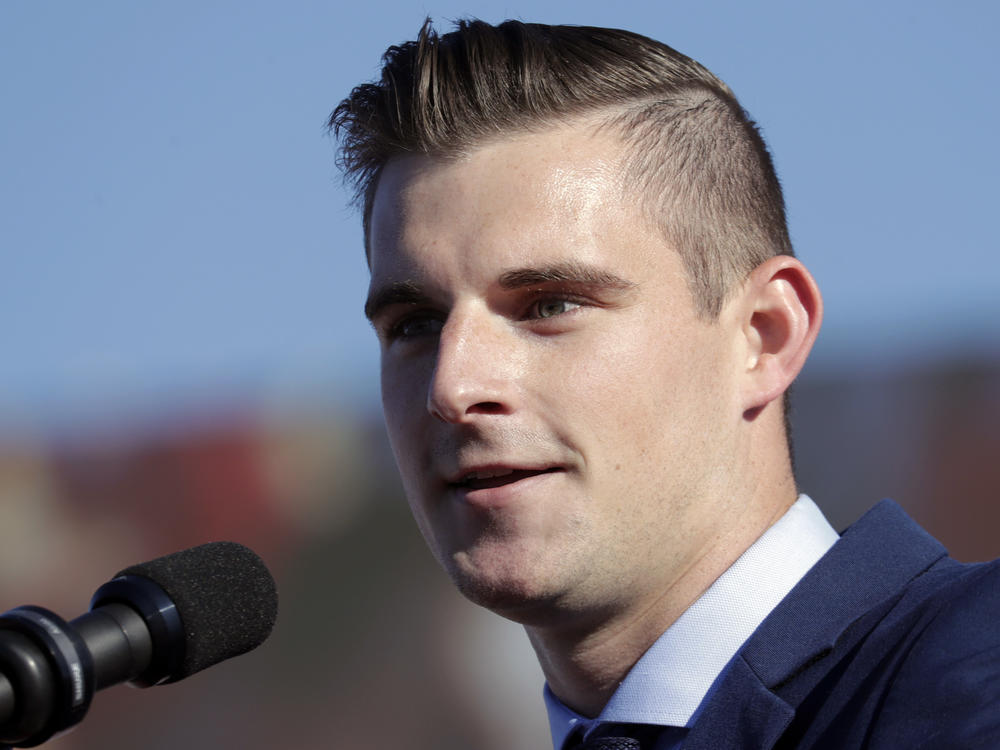 Bo Hines, Republican candidate for North Carolina's 13th Congressional District, speaks to the crowd at a rally in the state with former President Donald Trump in September.