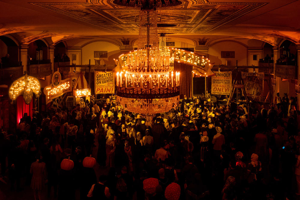 Hundreds of attendees can be seen from the balcony of one of the eight floors at Theatre Bizarre.