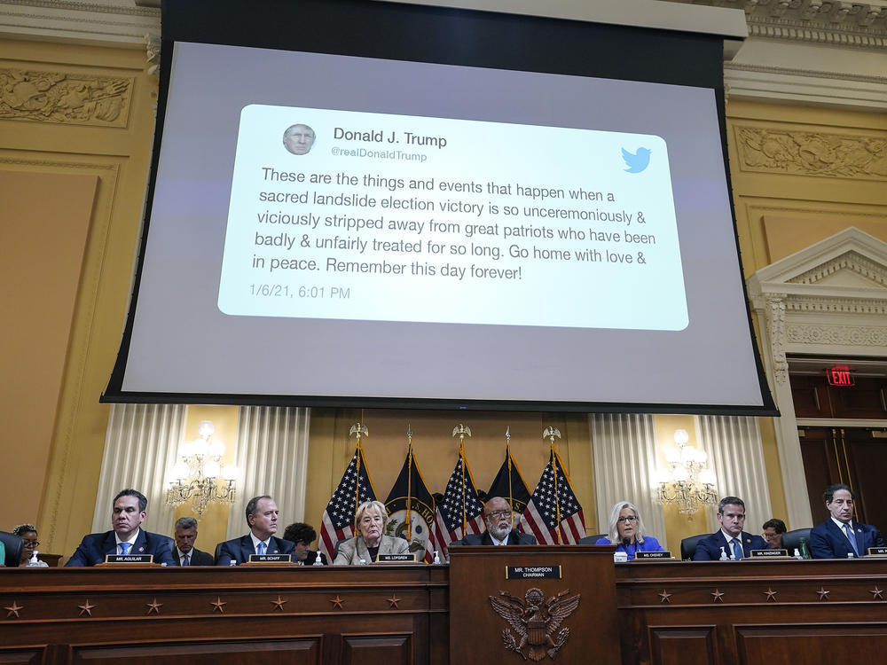 A tweet by former President Donald Trump is displayed on a screen during a hearing held by the House Jan. 6 committee on June 9.