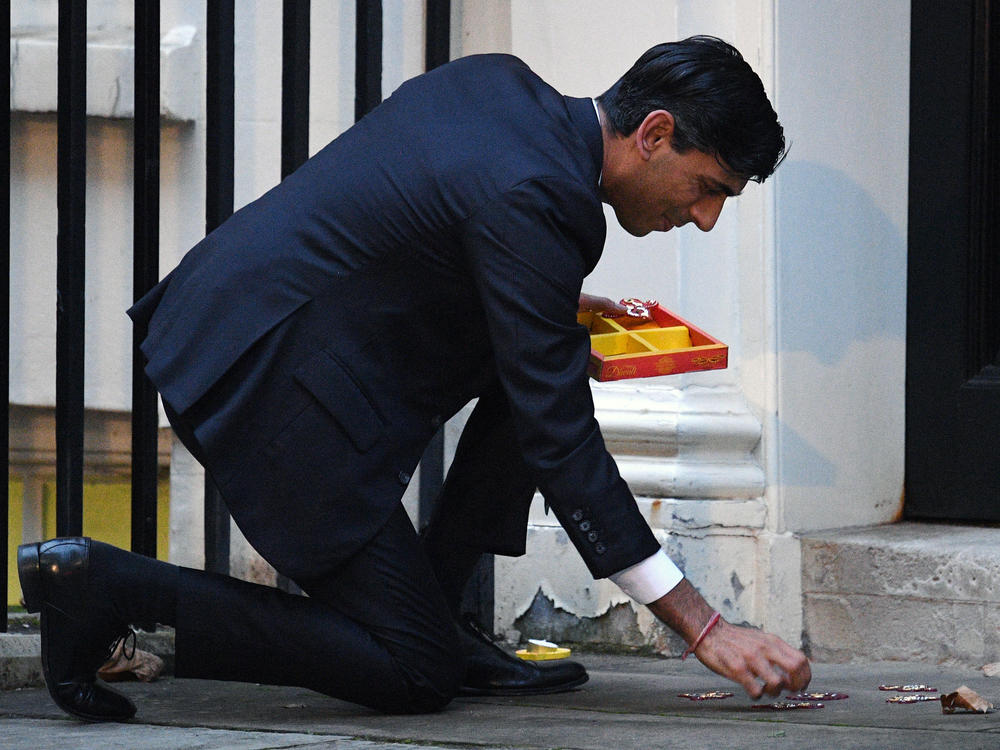 Rishi Sunak lights a candle for Diwali in Downing Street in 2020.