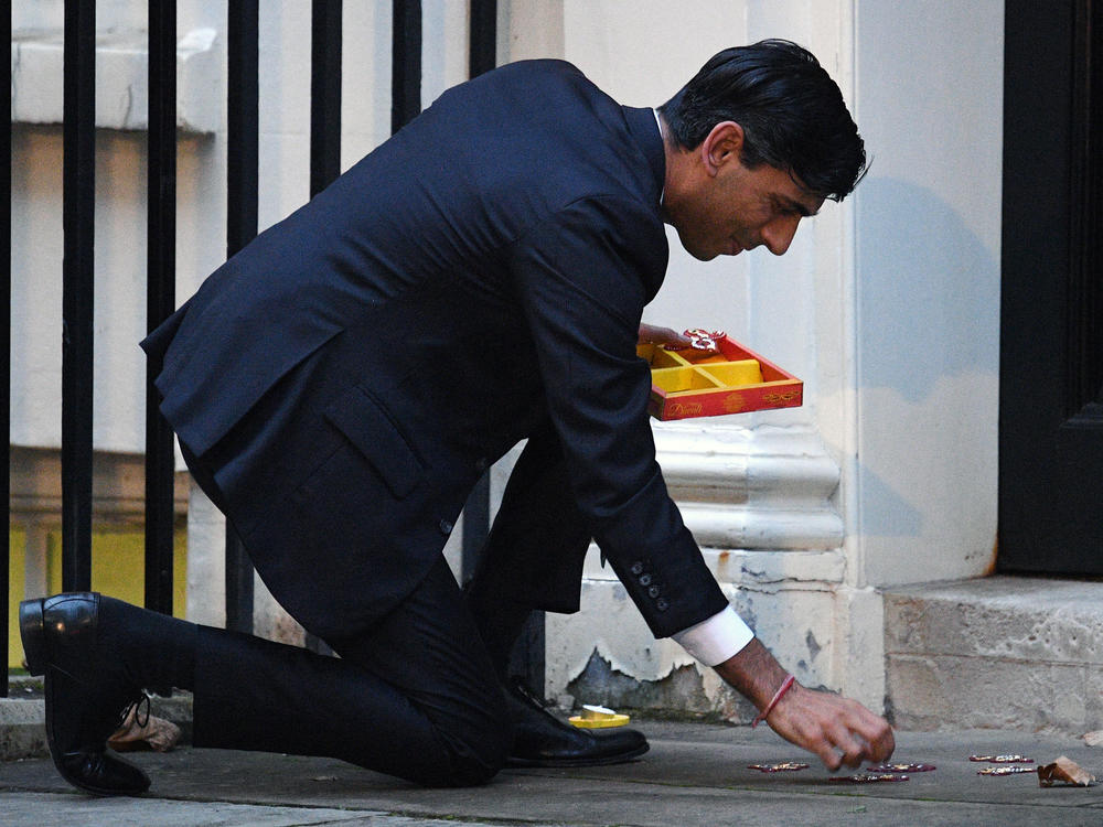 Rishi Sunak lights a candle for Diwali in Downing Street in 2020.