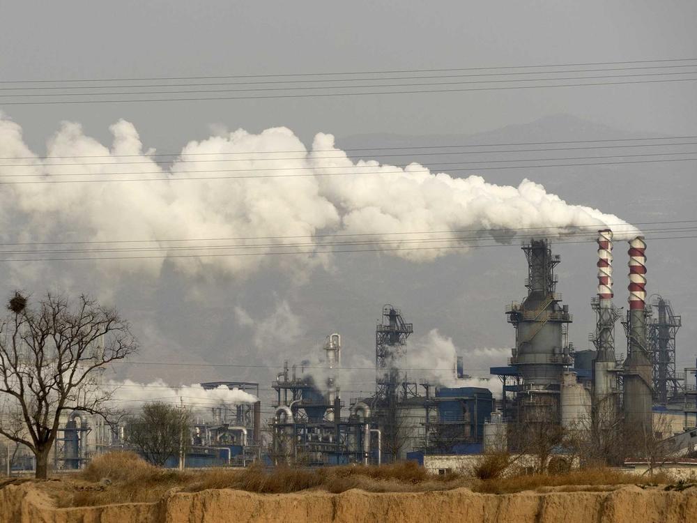 Coal power has resurged since the pandemic, like at this coal processing plant in China's Shanxi Province, but research shows it should be phased out by 2030 to avoid extreme climate change.