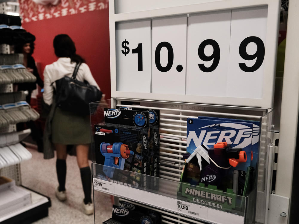 People shop in a Manhattan store on Oct. 26, 2022 in New York City. Inflation, in the form of higher prices for gas, food and other consumer goods is weighing on U.S. economic growth.