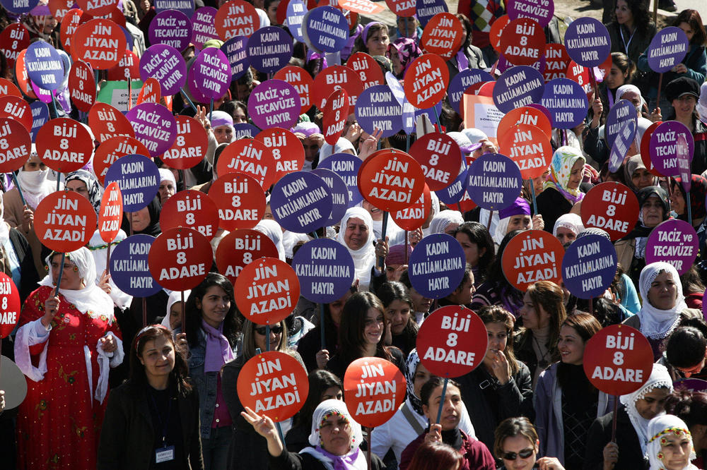 Kurdish women demonstrate during International Women's Day celebrations in Diyarbakir, Turkey, on March 10, 2007. Their protest signs read: 