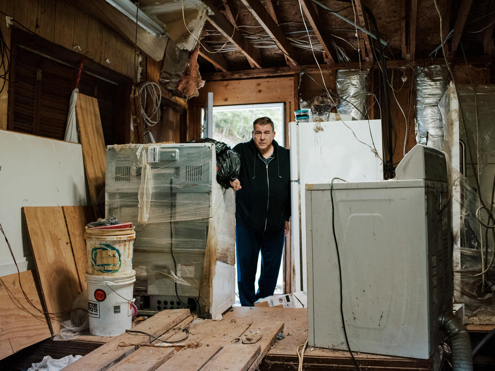 Miles Hatfield at his Kentucky home, which he had to abandon after it was flooded by runoff from an old coal mine.