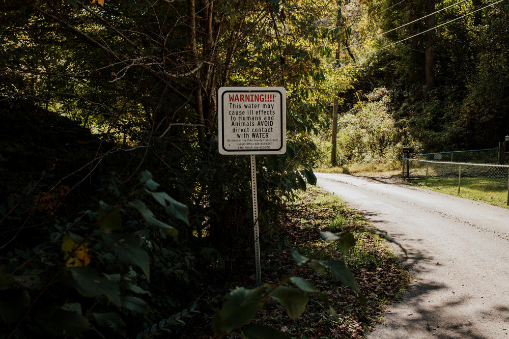 A sign of unknown vintage near a stream in Hardy, Ky., not far from Hatfield's house.