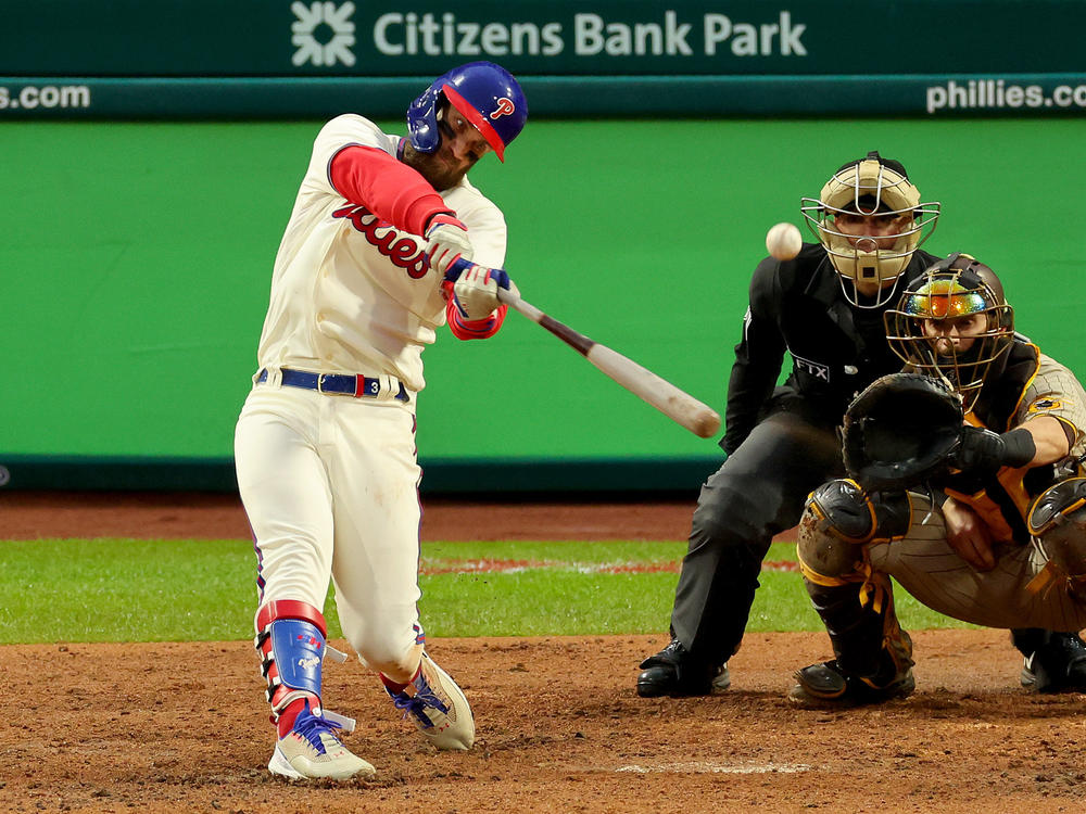 Phillies slugger Bryce Harper hits the series winning two-run homerun during the 8th inning against the San Diego Padres in game 5 of the National League Championship in Philadelphia on Oct. 23, 2022.