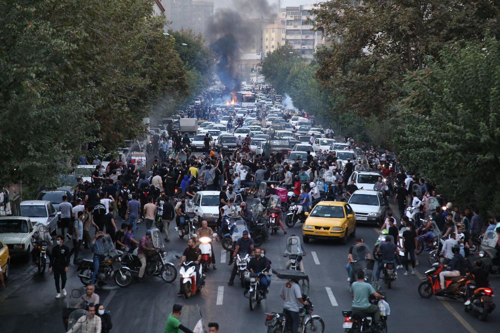Iranian demonstrators protest in Tehran on Sept. 21, after Mahsa Amini died in custody of the country's so-called morality police.