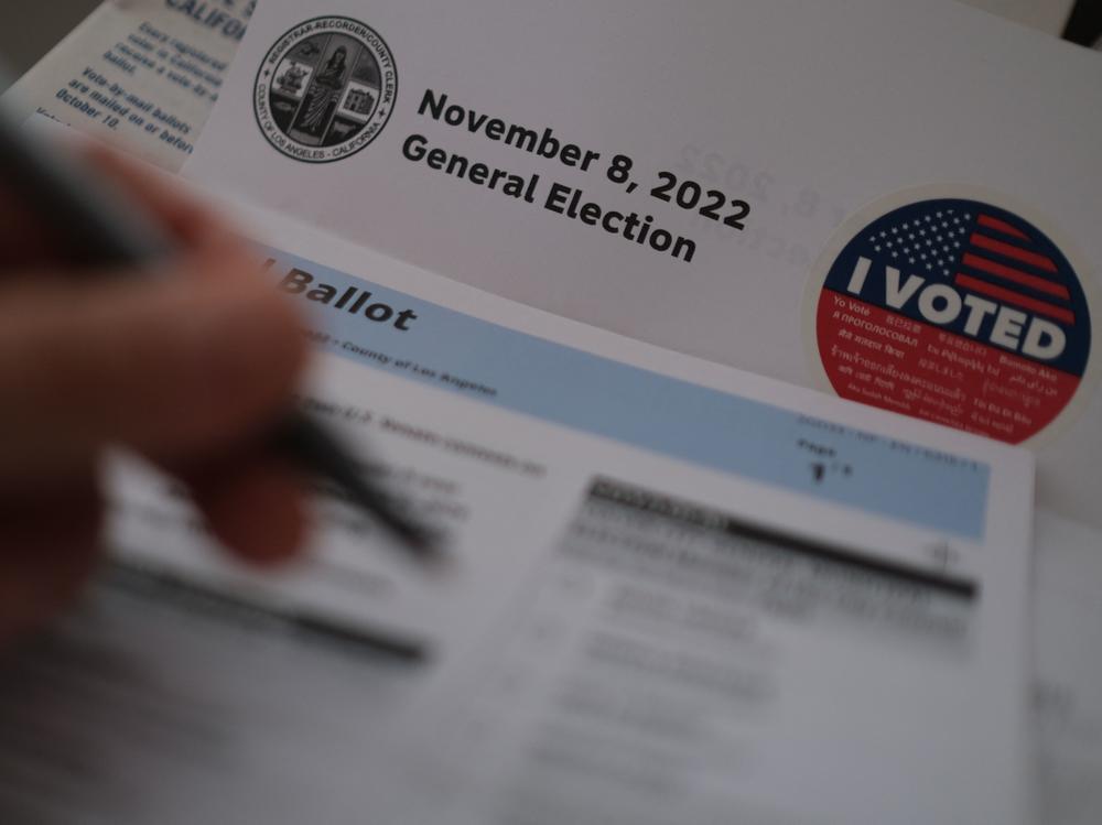 In this illustration photo, a voter fills out their ballot n Los Angeles on Monday.