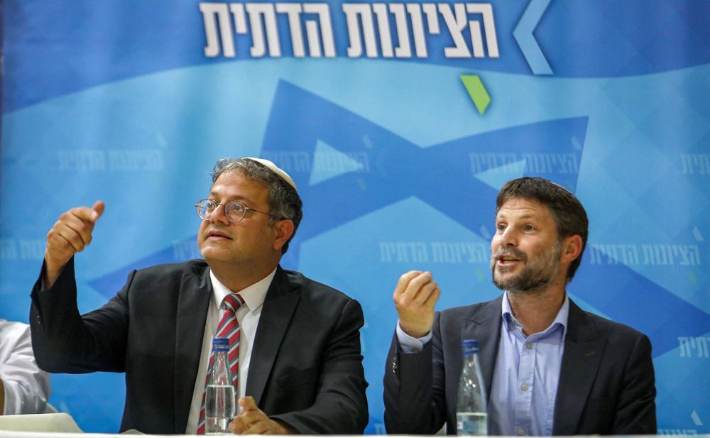 From left, far-right Israeli lawmakers Itamar Ben-Gvir, leader of the Jewish Power party, and Bezalel Smotrich, leader of the Religious Zionist Party, attend a rally with supporters in Sderot, Israel, last Wednesday.