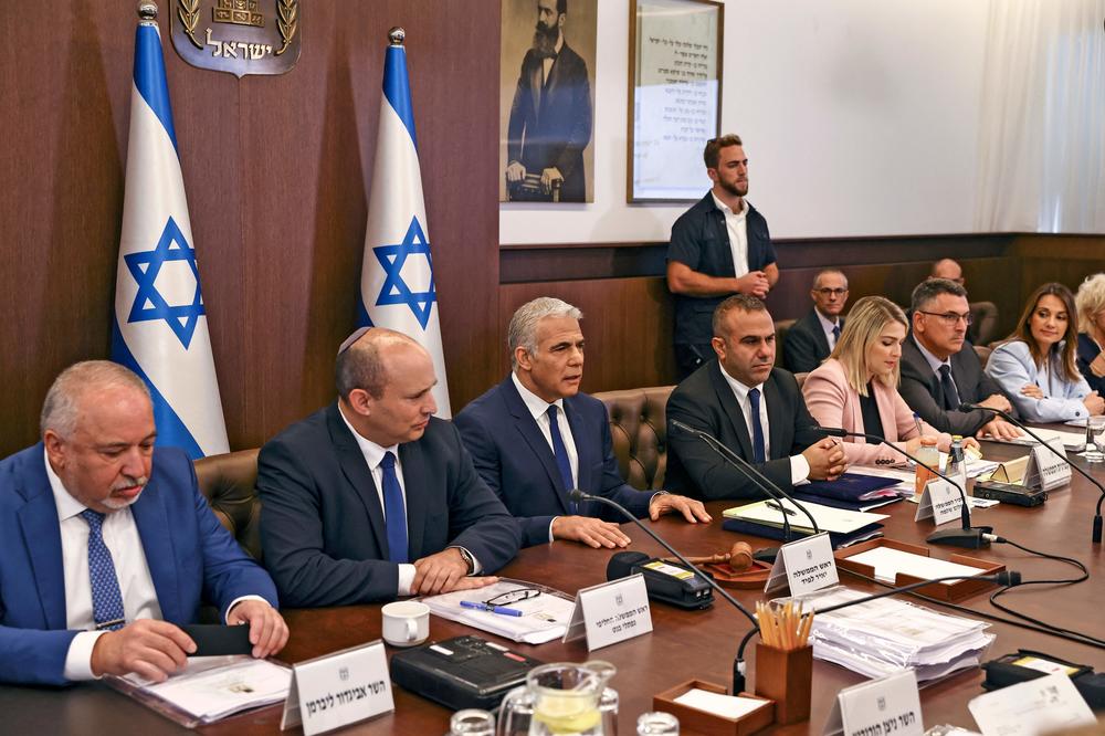 Israeli Prime Minister Yair Lapid, center, chairs a Cabinet meeting to approve the U.S.-brokered deal setting a maritime border between Israel and Lebanon, at in Jerusalem last Thursday.