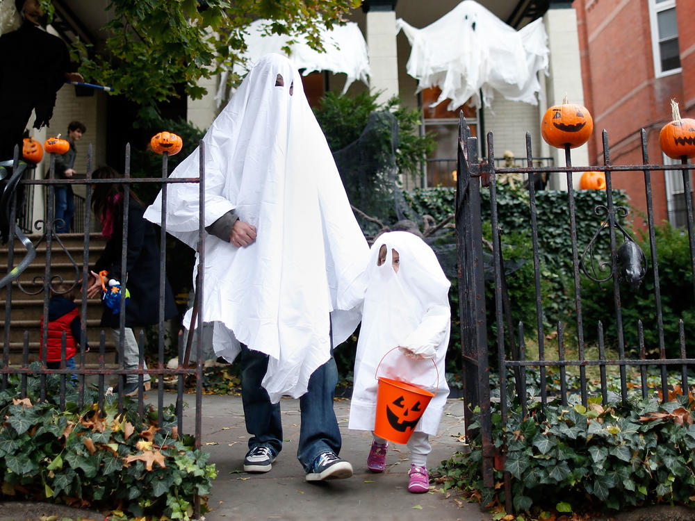 A family goes trick or treating in Fort Greene, Brooklyn, in 2012.