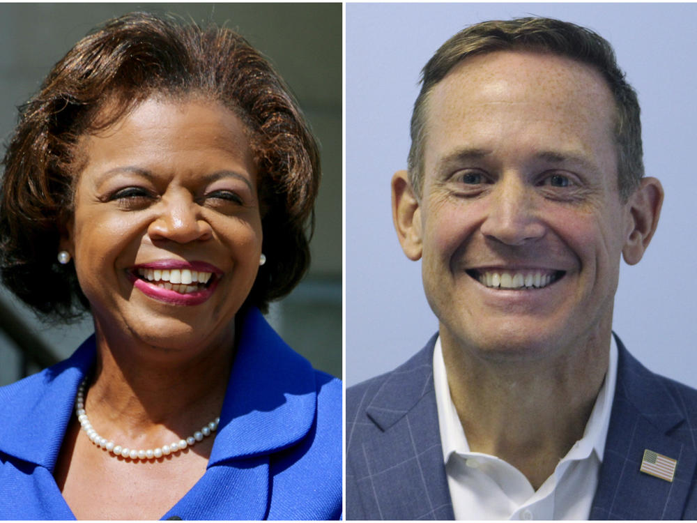 This combination of photos shows North Carolina Democratic Senate candidate Cheri Beasley on Aug. 29 in Durham, N.C., left, and Republican candidate Rep. Ted Budd, R-N.C., on Sept. 25 in Mount Airy, N.C.