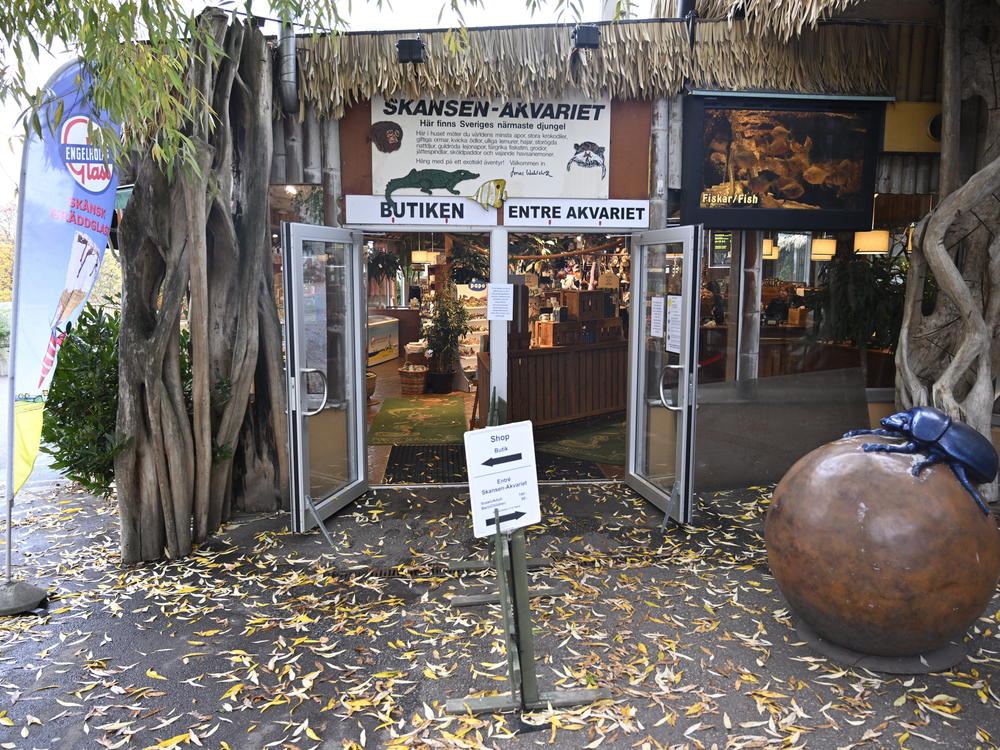 The Skansen Aquarium's entrance, part of the zoo on Djurgarden island, where a deadly snake escaped on Saturday via a light fixture in the ceiling of its glass enclosure, in Stockholm, Sweden, on Monday.