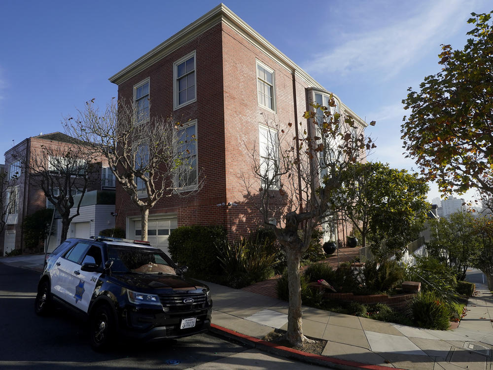 A police vehicle is parked outside the home of House Speaker Nancy Pelosi in San Francisco, on Saturday. Accused assailant David Wayne DePape faces felony charges — assault and attempted kidnapping of an immediate family member of a U.S. official — which could land him in prison for a maximum of 50 years.