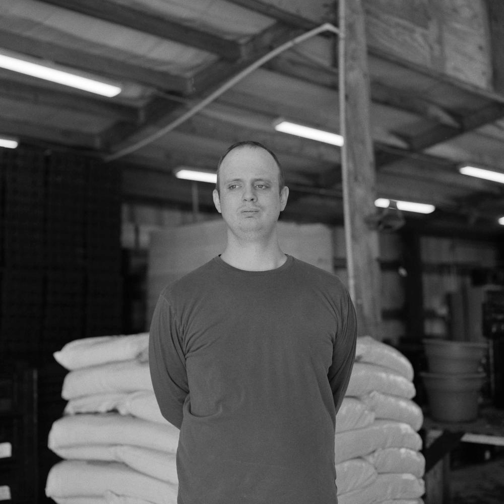 Andrew Dennett is a team member at Hugs Greenhouse in McKinney, Texas.