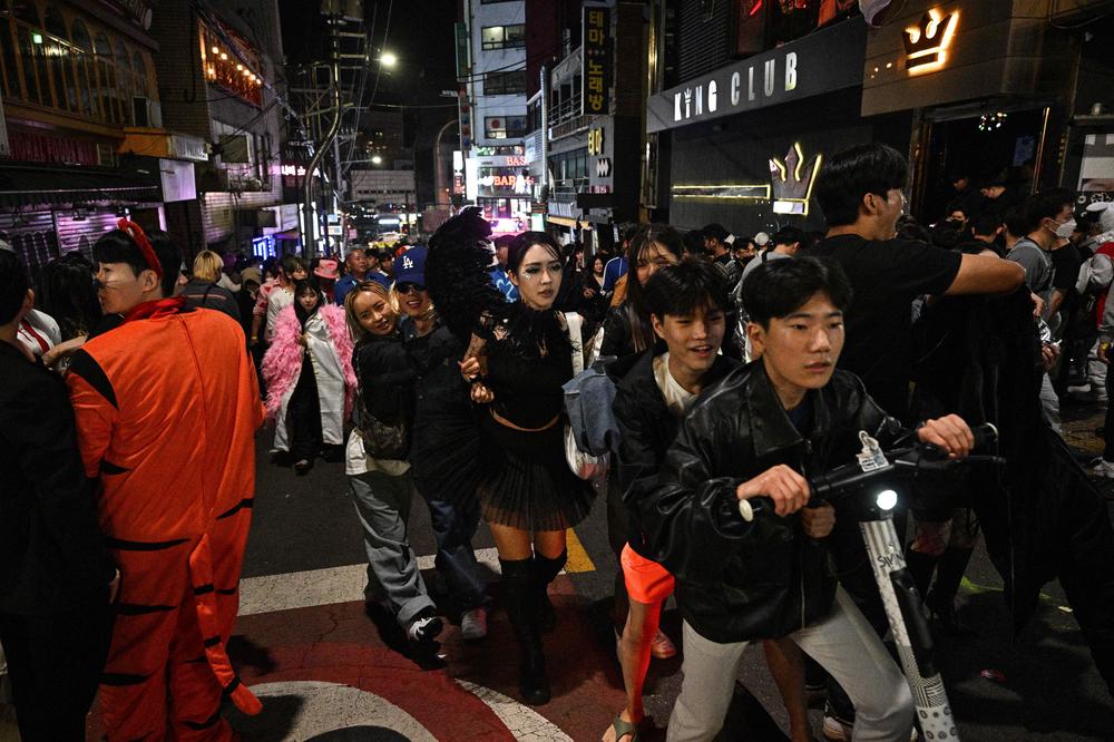 Halloween celebrations in the Itaewon neighborhood in Seoul before the stampede took place on Saturday night.