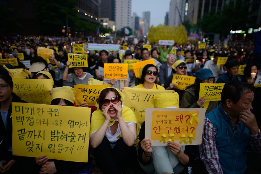 Demonstrators in Seoul denounce the South Korean government response at a rally for victims of the Sewol ferry disaster on May 24, 2014.