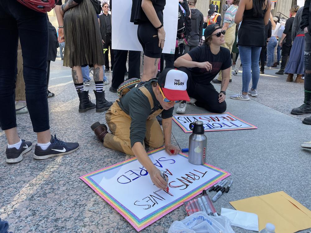 Dozens of counter-protesters attempted to disrupt an anti-trans rally outside the Tennessee capitol building on October 21 with signs, sirens and shouting.