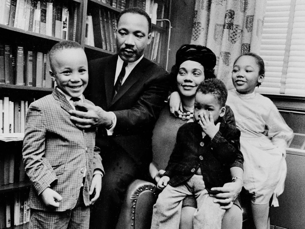 Dr. Martin Luther King Jr. and his wife, Coretta Scott King, sit with three of their four children in their Atlanta, Ga., home in 1963. From left are: Martin Luther King III, 5, Dexter Scott, 2, and Yolanda Denise, 7.