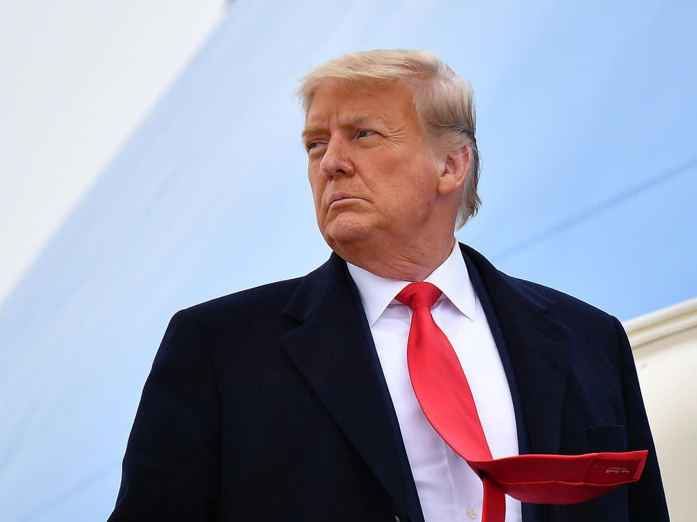 Then-President Donald Trump boards Air Force One before departing Harlingen, Texas on Jan. 12, 2021.