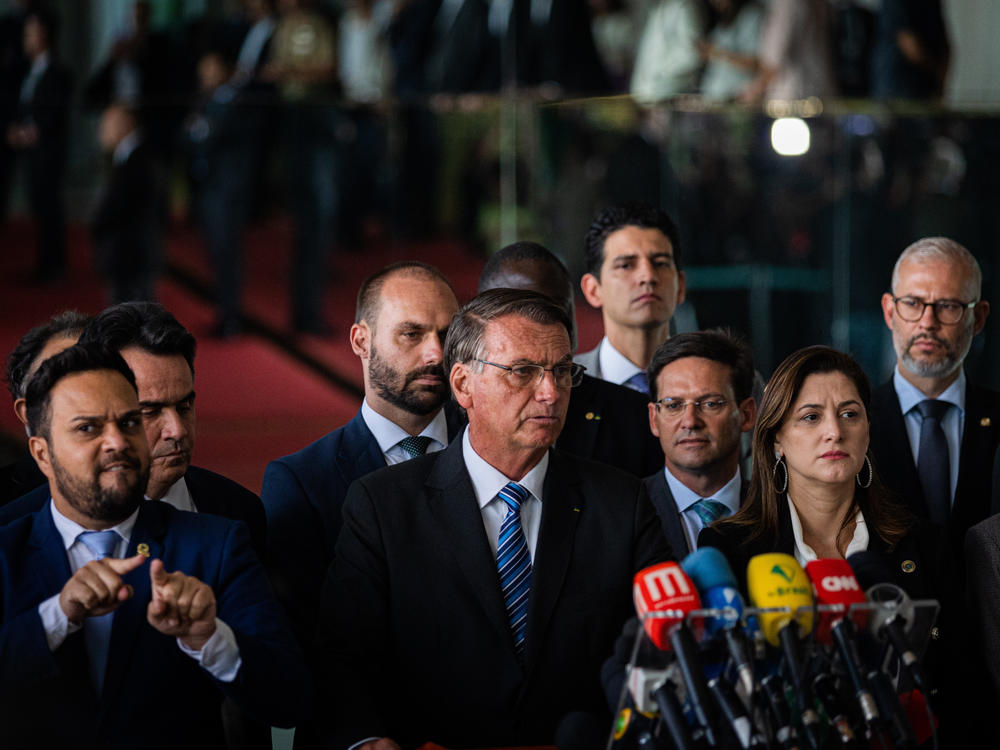 Brazilian President Jair Bolsonaro speaks during a news conference at Alvorada Palace in Brasília, Brazil, on Tuesday. Bolsonaro vowed to follow the constitution in his first speech after narrowly losing Sunday's runoff election to Luiz Inácio Lula da Silva, but didn't formally concede.