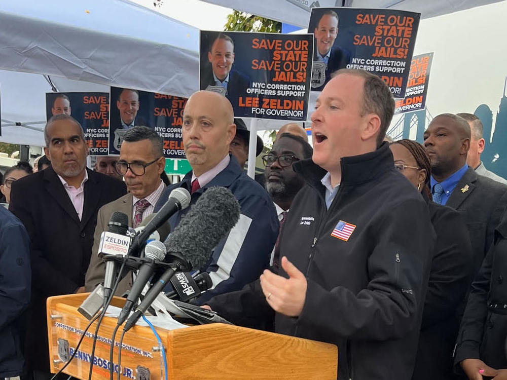 Republican congressman Lee Zeldin campaigns for governor outside Rikers Island jail in New York.