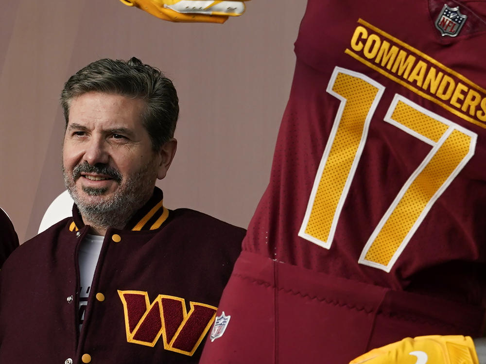Washington Commanders owner Dan Snyder poses for photos during an event to unveil the NFL football team's new name on Feb. 2 in Landover, Md.