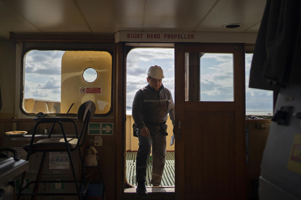 U.N. inspector Shamil Berdaliev walks through the Tzarevich ship during an inspection.