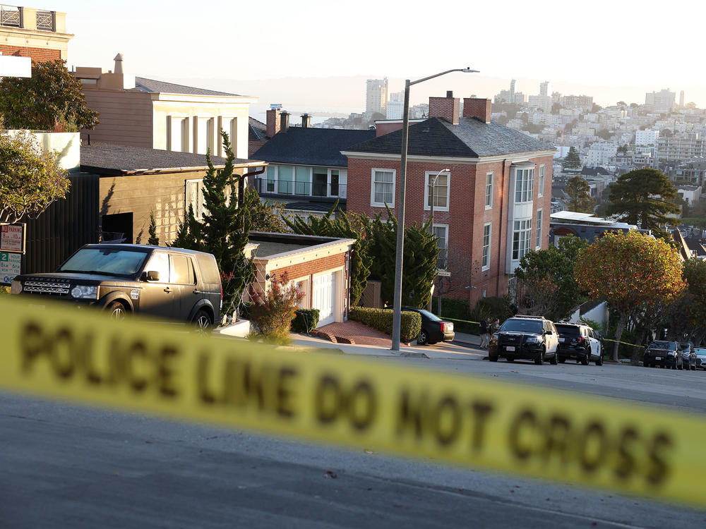 Police tape is seen in front of the home of House Speaker Nancy Pelosi and her husband, Paul Pelosi, on Friday in San Francisco. Paul Pelosi was violently attacked in their home by an intruder.