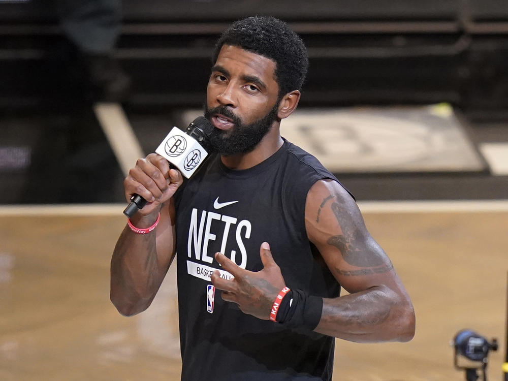 Brooklyn Nets' Kyrie Irving speaks before the team's NBA basketball game against the New Orleans Pelicans on Oct. 19, 2022, in New York. The Nets are suspending Irving for at least five games without pay, saying they were dismayed by his failure to 