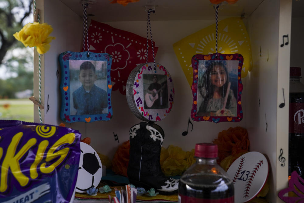 Xavier Lopez's altar included photos of his girlfriend, Anabelle Rodriguez, and him. They were buried together.