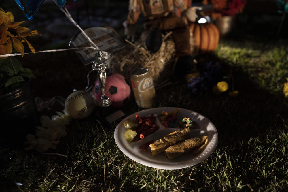 Offerings on Tess Marie Mata's altar included her favorite foods.