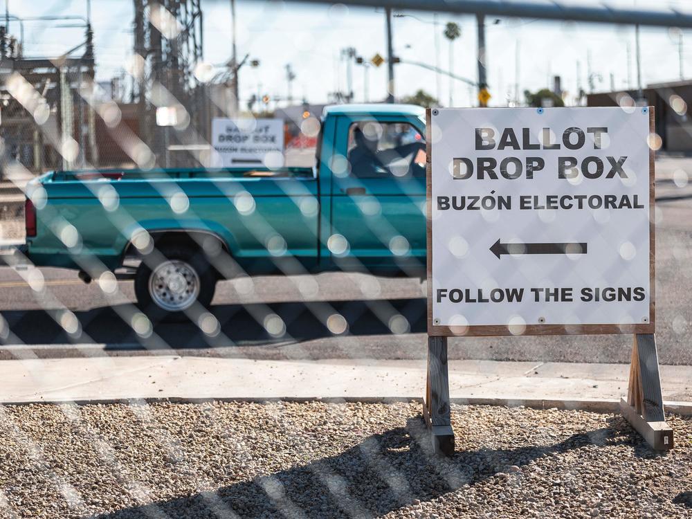 Fences surround the Maricopa County Tabulation and Elections Center (MCTEC) in Phoenix, Arizona, on Oct. 25, 2022, to help prevent incidents and pressure on voters at the ballot drop box.
